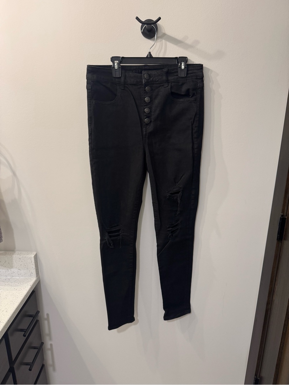 Black distressed super high rise jeggings